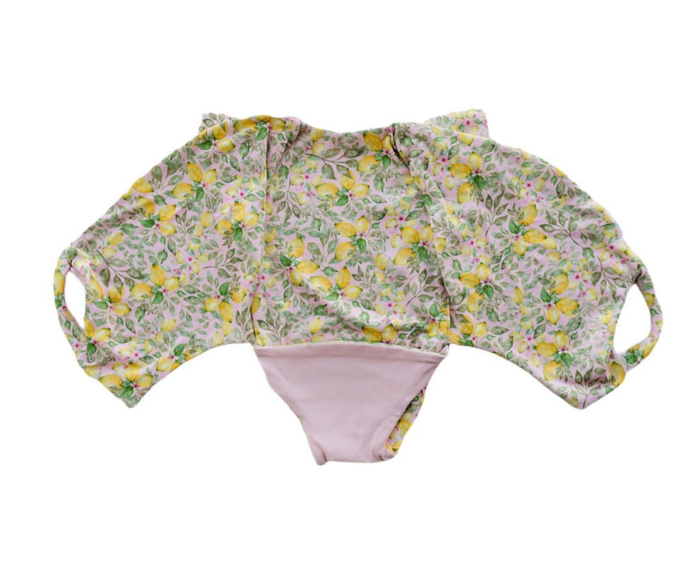 Pink Lemonade short-sleeve bodysuit for baby in Classic Brushed fabric styles with a cheerful floral print.