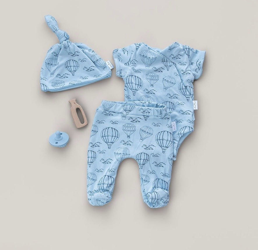 Short-sleeve baby onesie outfit bundle made from bamboo cotton in bon voyage design.
