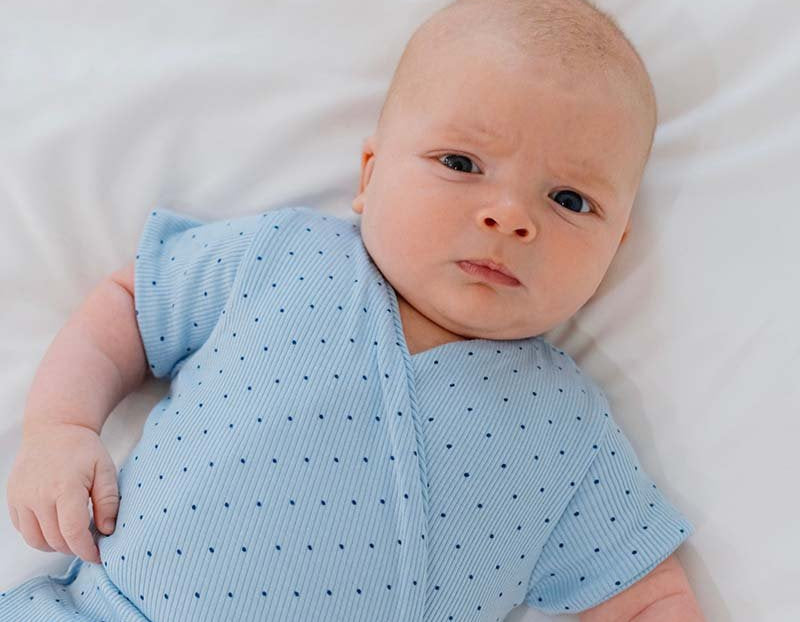 Dotted Blues design short sleeve winged bodysuit.