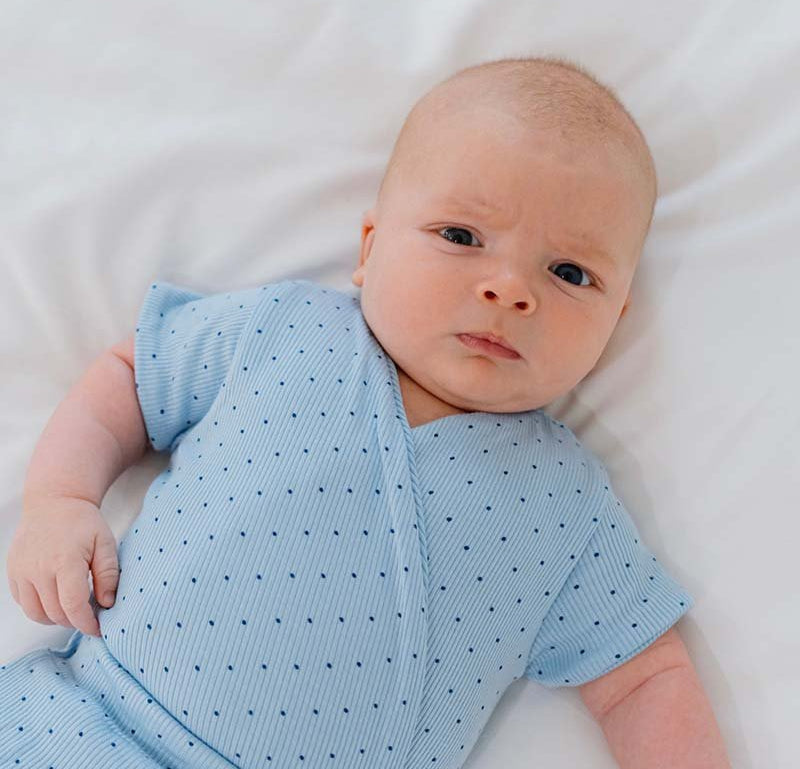 Dotted Blues design short-sleeved winged bodysuit.
