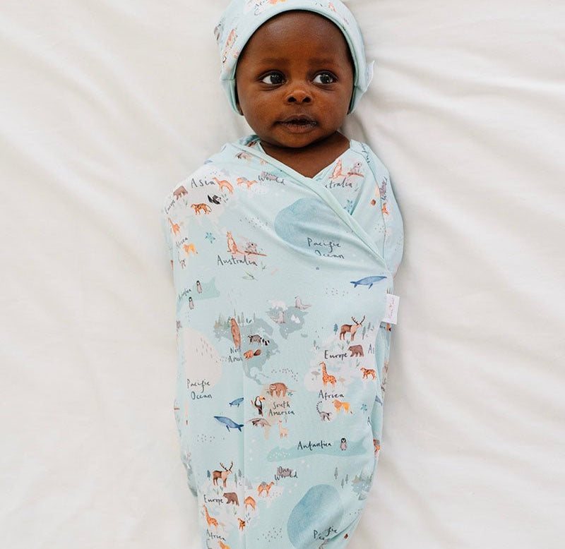 Soft baby cocoon swaddle made from Silky Modal in the World Traveler design.