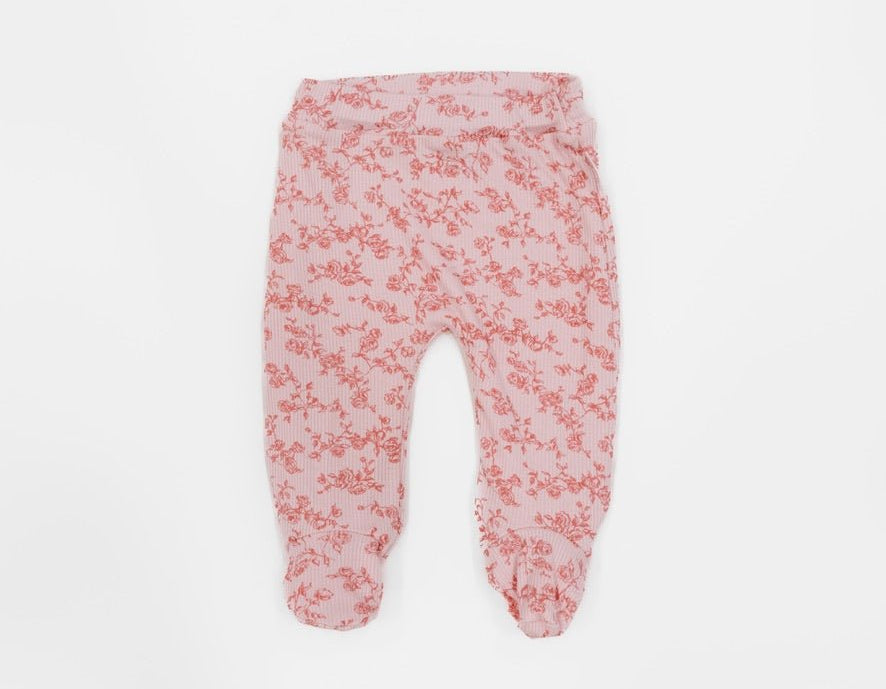 Silky modal baby footie pants featuring the charming Bitty Pink Blooms design.