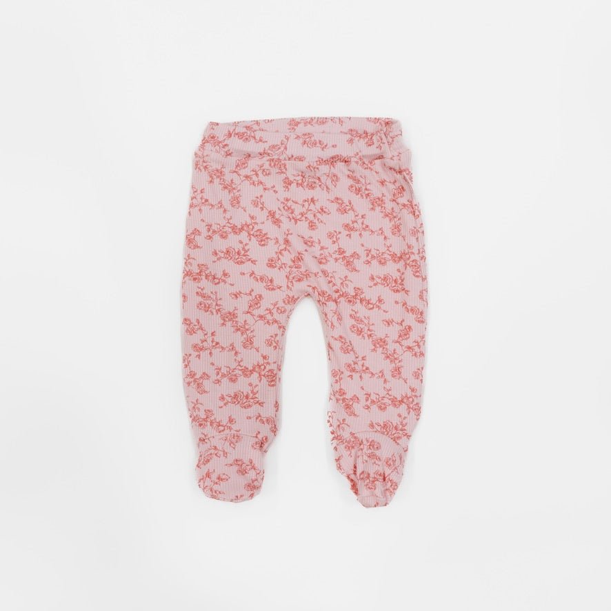 Silky modal baby footie pants featuring the charming Bitty Pink Blooms design.