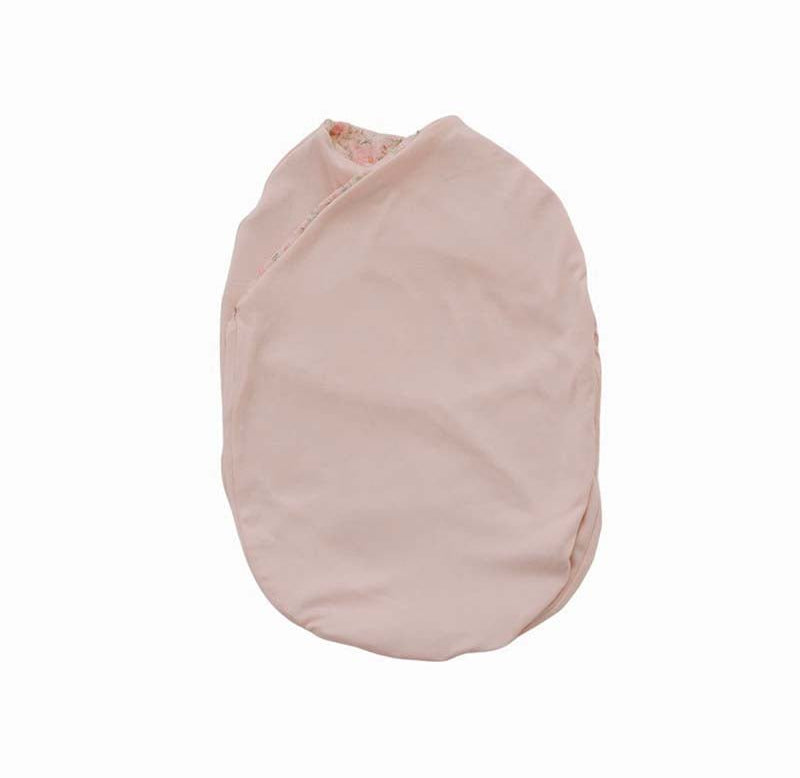 Baby cocoon swaddle blanket made with smooth Silky Modal in Dusty Roses.