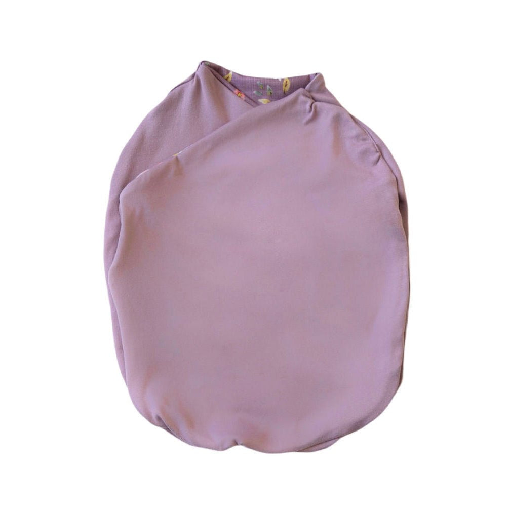 Lightweight reversible Peachy Lilac baby cocoon swaddle in soft Silky Modal.