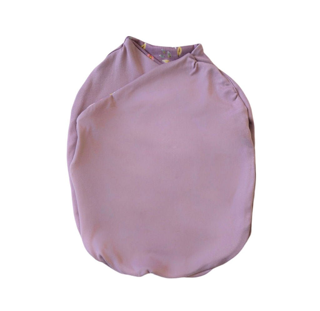Lightweight reversible Peachy Lilac baby cocoon swaddle in soft Silky Modal.