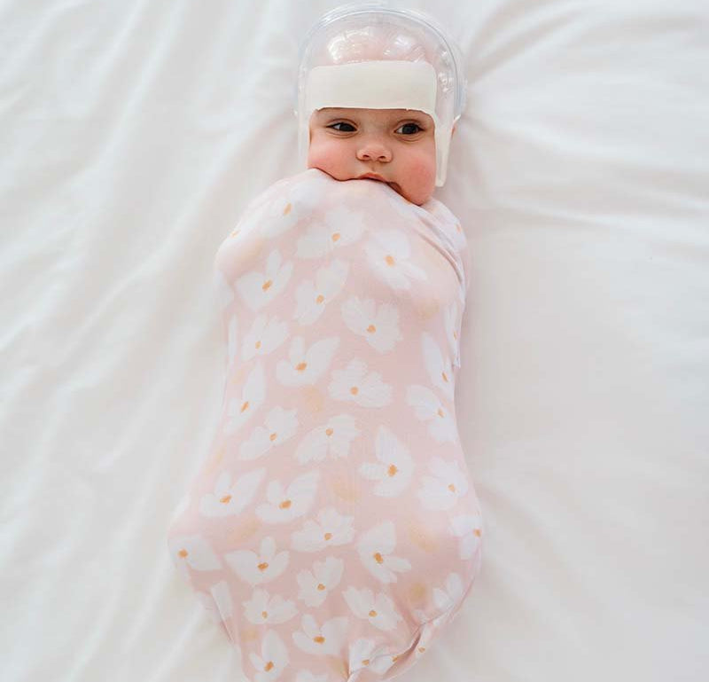 Lightweight Sweet Lily baby cocoon swaddle in soft Silky Modal.