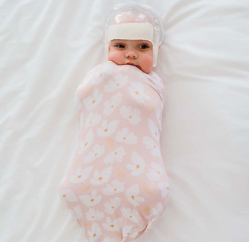 Lightweight Sweet Lily baby cocoon swaddle in soft Silky Modal.