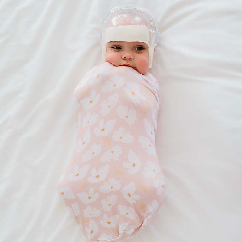 Lightweight Sweet Lily baby cocoon swaddle in soft Silky Modal.