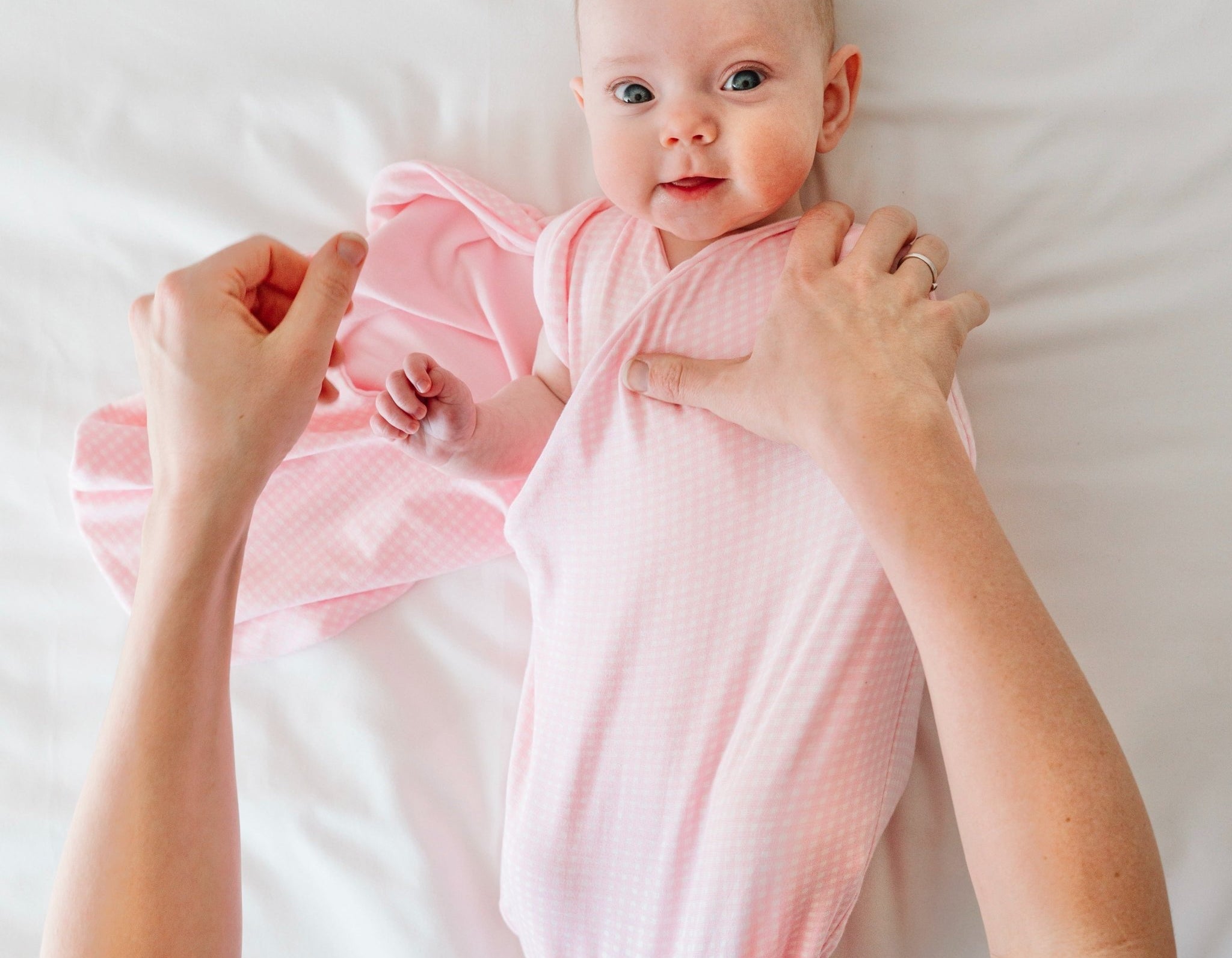 Silky modal newborn essentials bundle featuring a long sleeve top with ruffle cuffs.