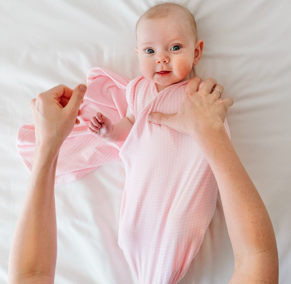 Silky modal newborn essentials bundle featuring a long sleeve top with ruffle cuffs.