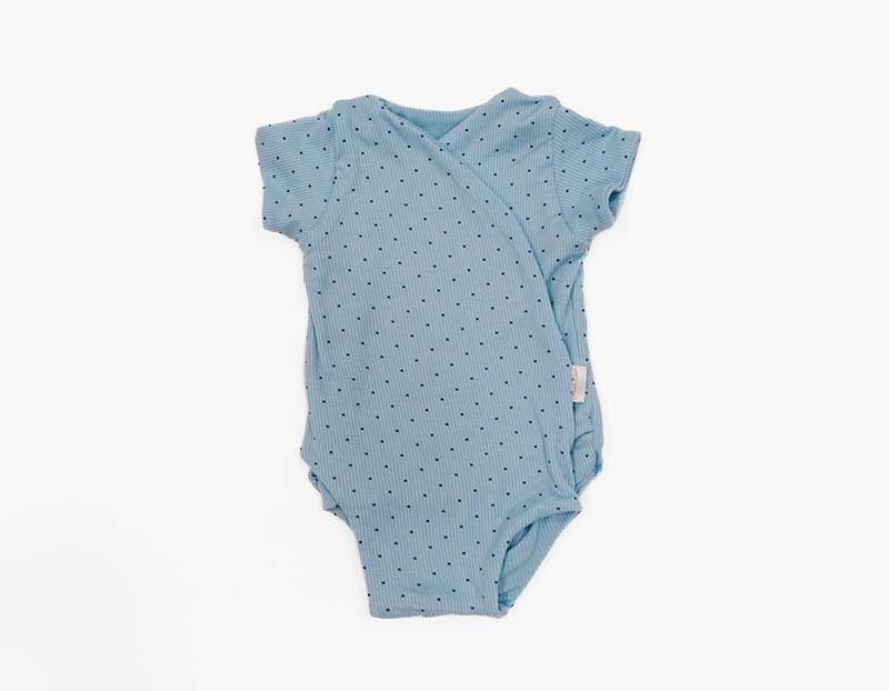 Dotted Blues design winged bodysuit for babies in silky modal fabric.