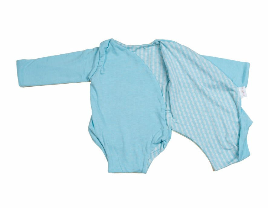 Reversible long sleeved winged bodysuit for babies in silky modal fabric.