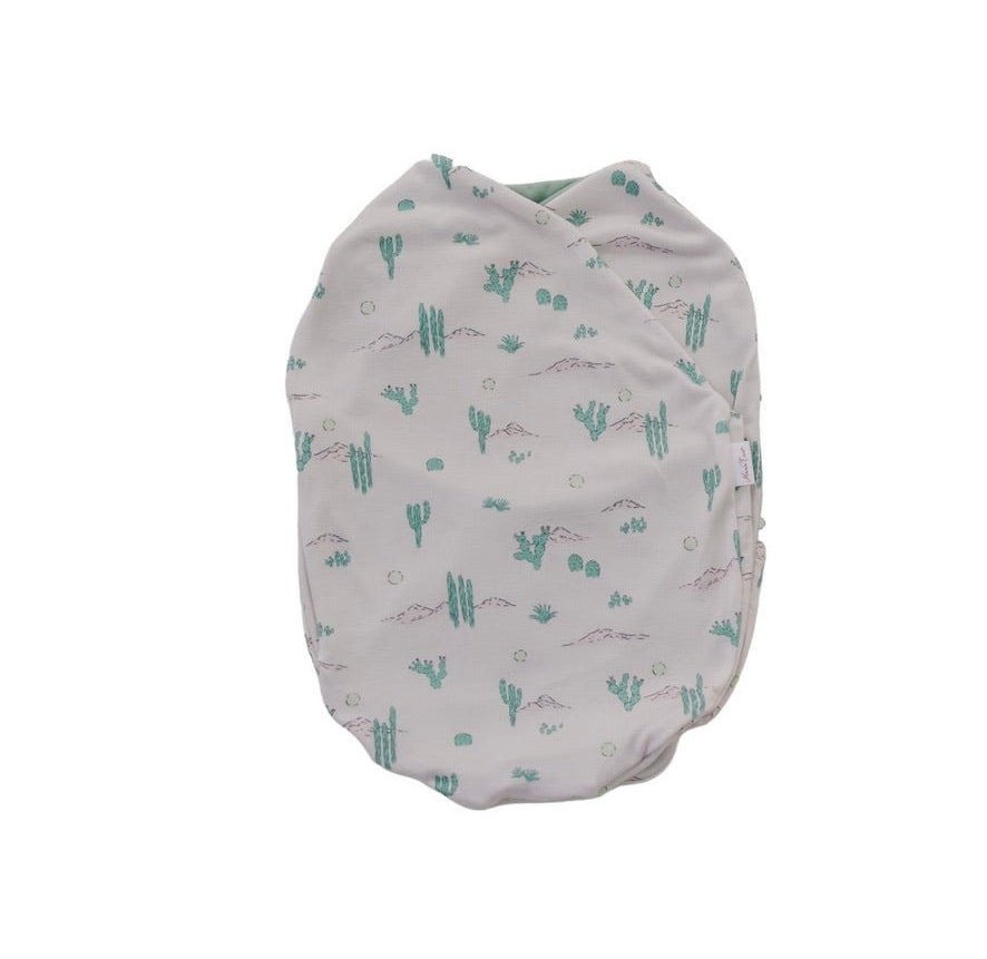Silky Modal baby cocoon swaddle in Desert Sunsets for newborn comfort.