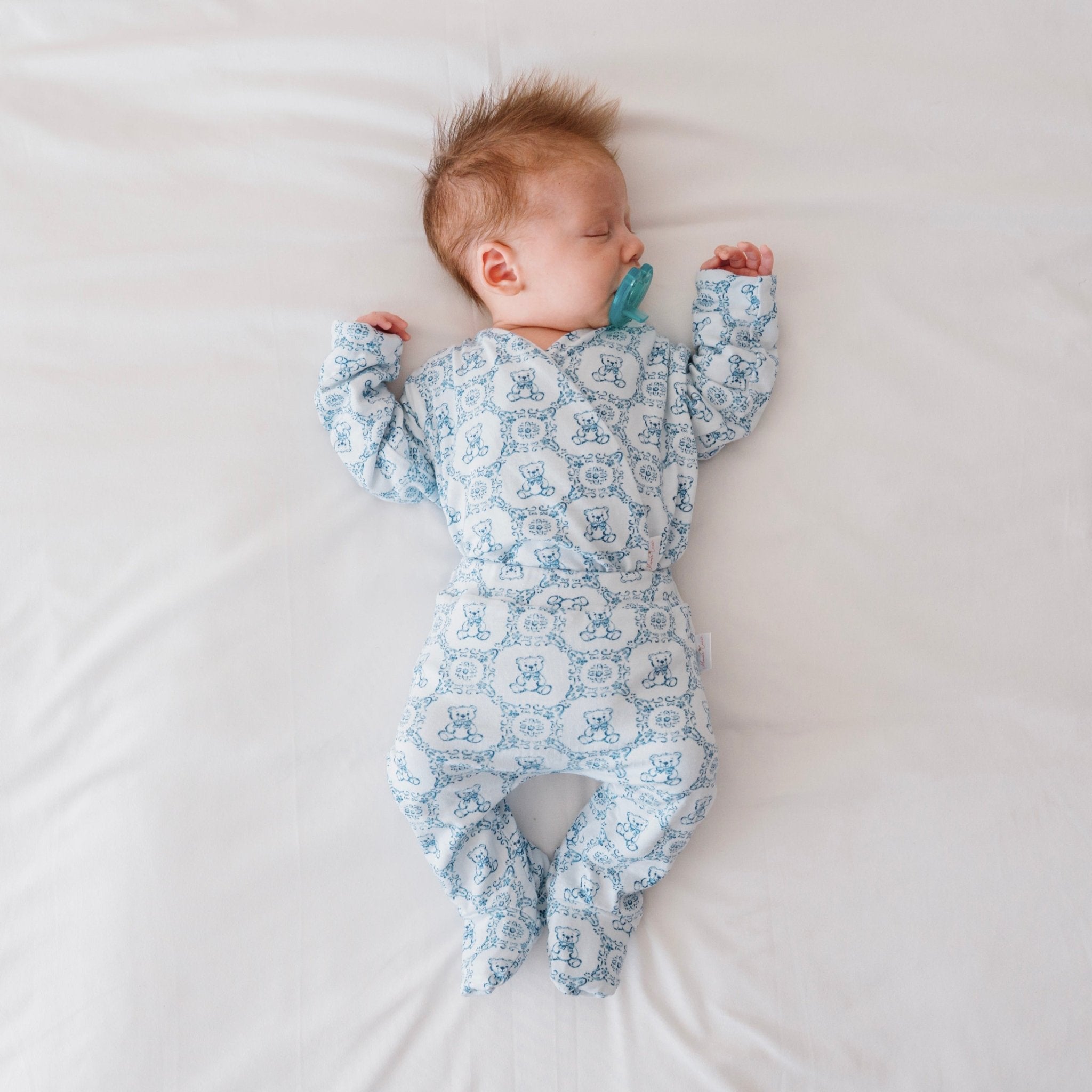 Long-sleeve winged bodysuit newborn baby essentials bundle in bamboo cotton.