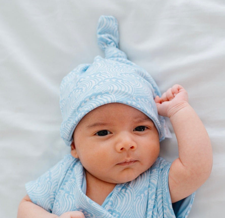 Classic brushed reversible baby beanie in Blue Swells for a soft everyday accessory.