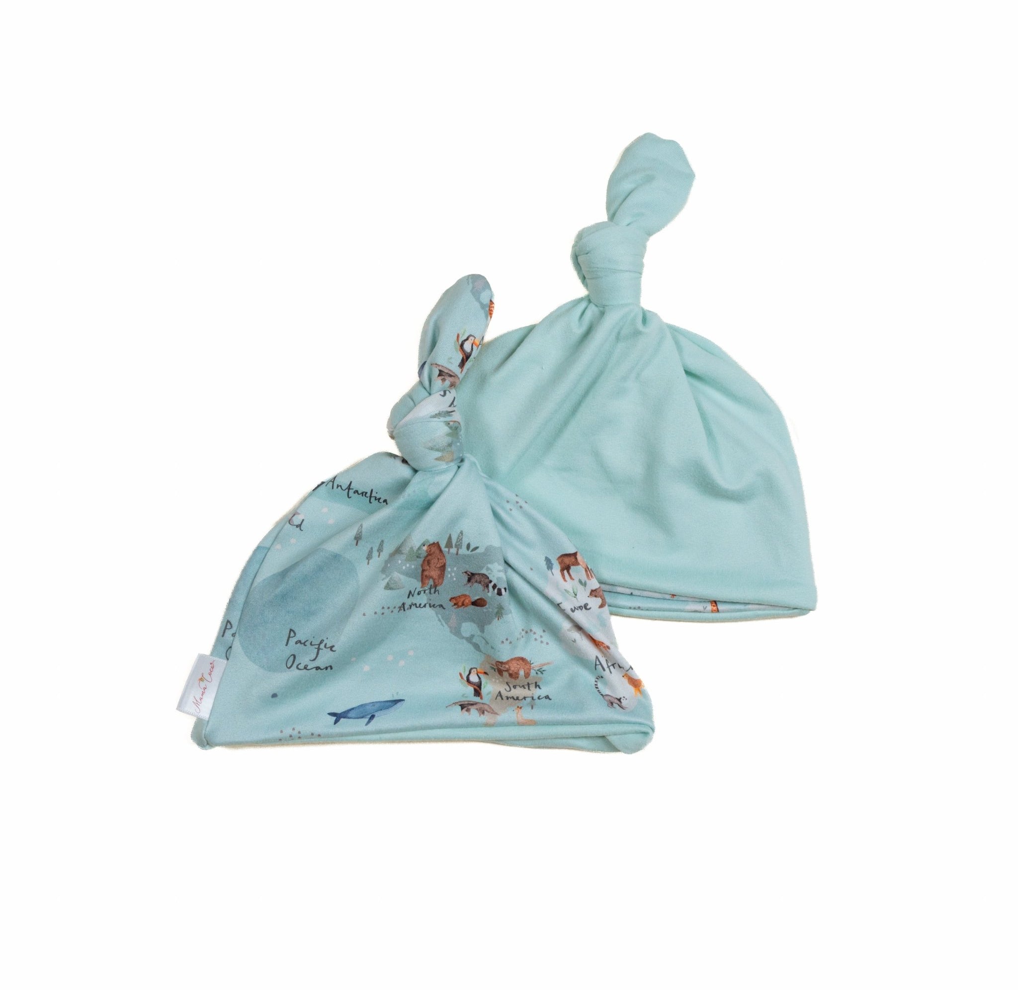 Reversible baby beanie featuring the World Traveler print with cozy classic brushed softness.