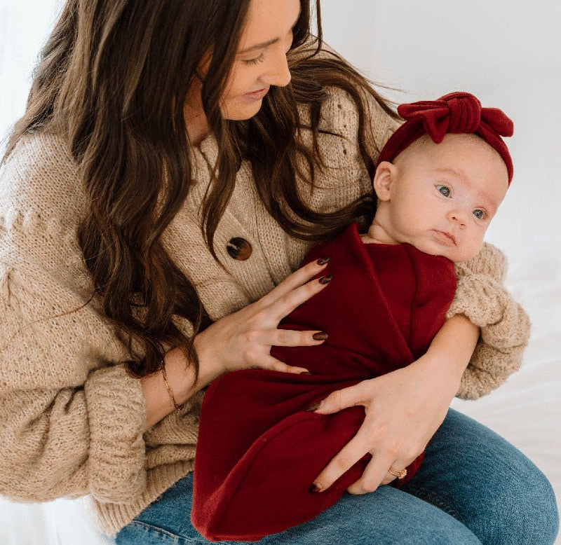 Reversible baby cocoon swaddle blanket for newborns.