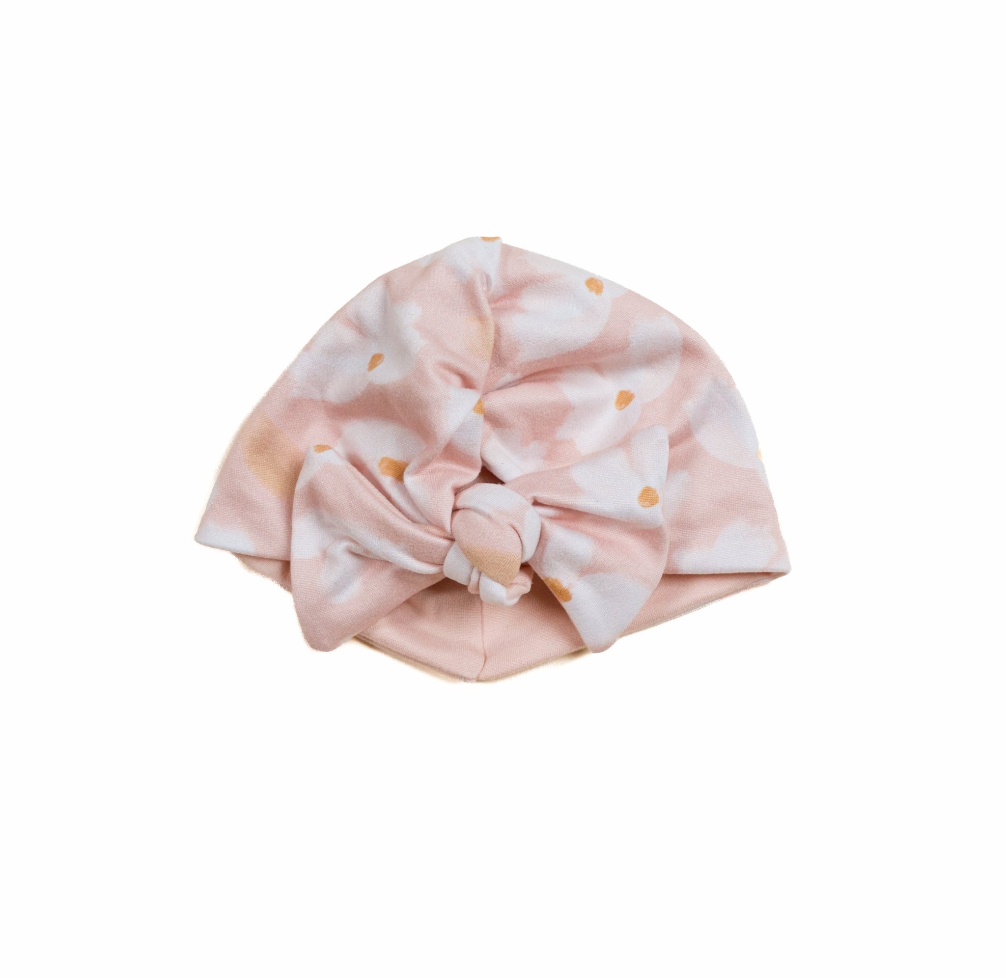 Comfortable Dusty Roses ruched baby beanie with bow crafted from classic brushed fabric.