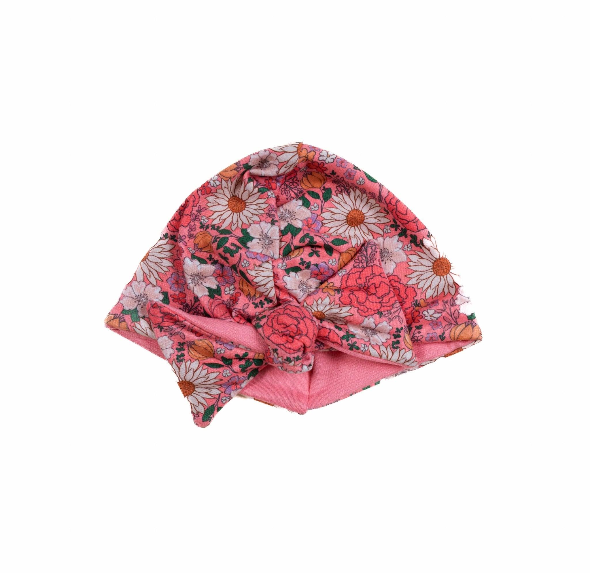 Infant accessory featuring a ruched beanie with bow for babies in Flower Power design.