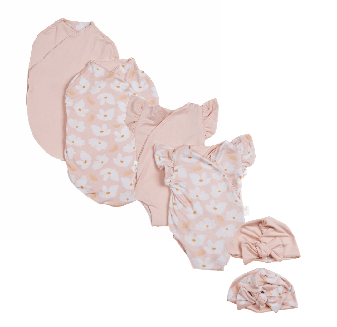 Newborn essentials bundle with flutter sleeves in classic brushed fabric with sweet lily design.