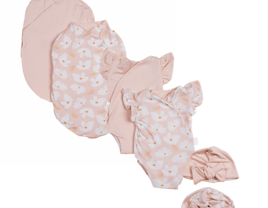 Newborn essentials bundle with flutter sleeves in classic brushed fabric with sweet lily design.