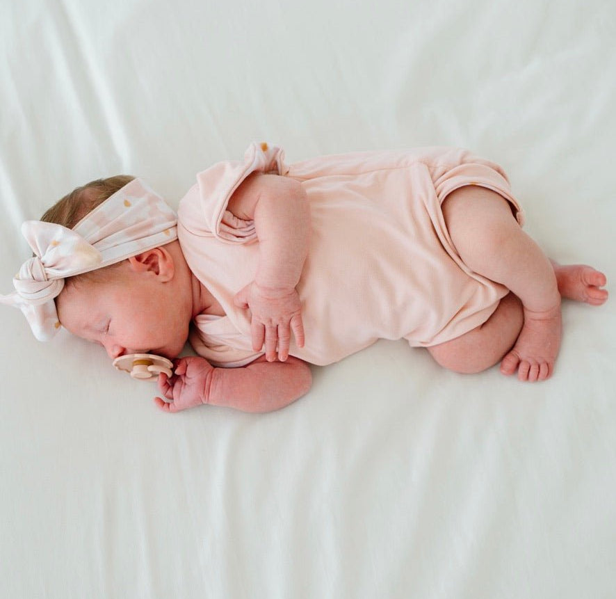 Reversible floral Sweet Lily short-sleeve bodysuit for baby in Classic Brushed fabric styles for everyday wear.