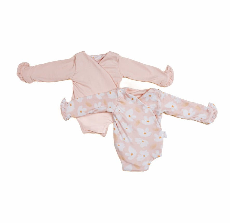 Reversible ruffle cuff baby bodysuit with wings in Sweet Lily design classic brushed fabric for babies.