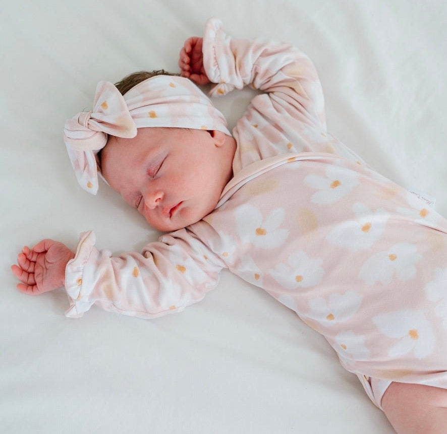 Ruffle cuff baby bodysuit with wings in Sweet Lily design classic brushed fabric.