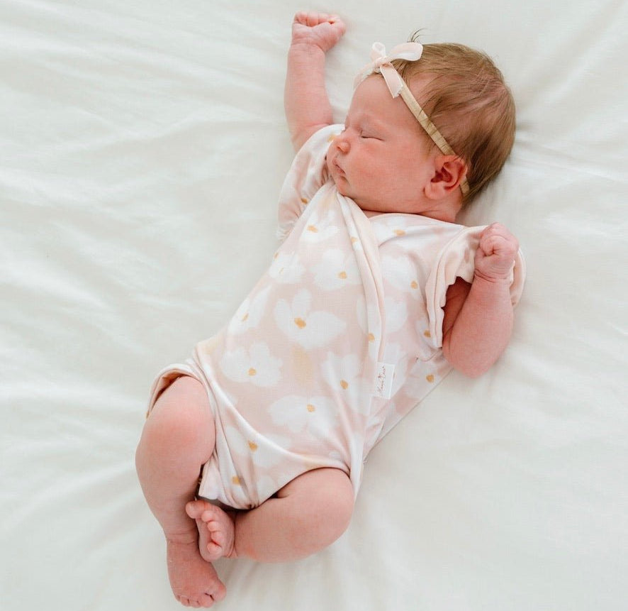 Sweet Lily short-sleeve bodysuit for baby in Classic Brushed fabric styles featuring a delicate floral print.