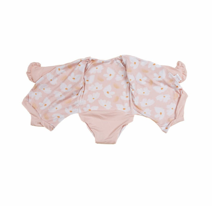 Baby long sleeve bodysuit in Sweet Lily design brushed fabric featuring wing details and ruffle cuffs.
