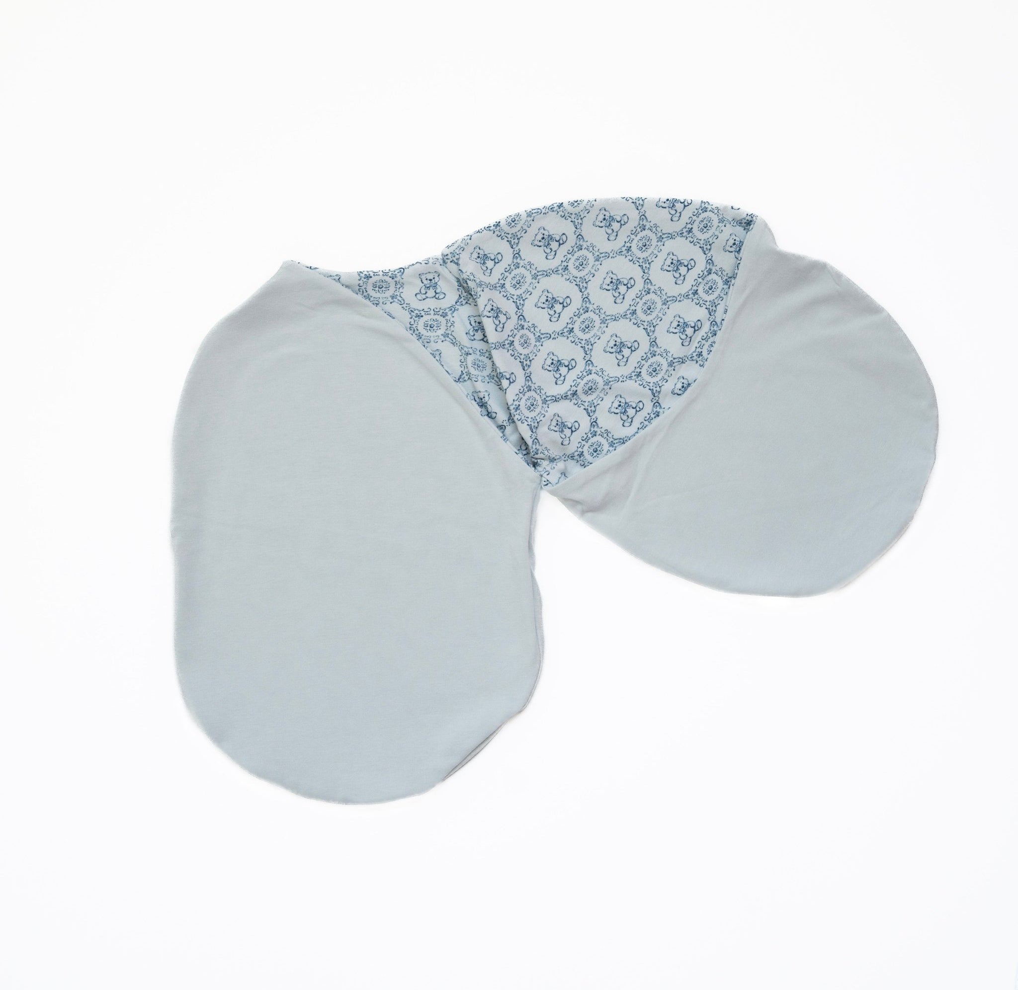 Teddy Tiles baby swaddle cocoon blanket in bamboo cotton fabric.