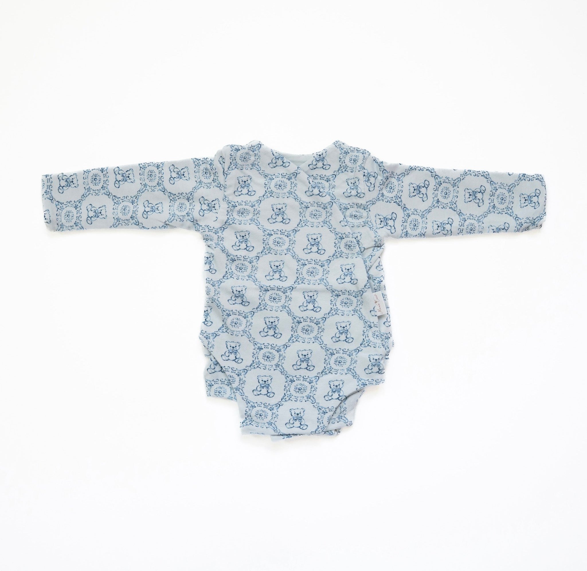 Long-sleeve winged bodysuit for babies.