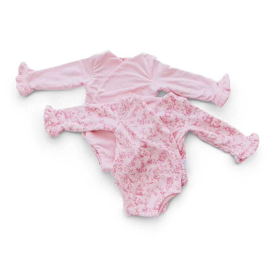 Reversible whimsical garden long sleeve ruffle cuff baby onesie.