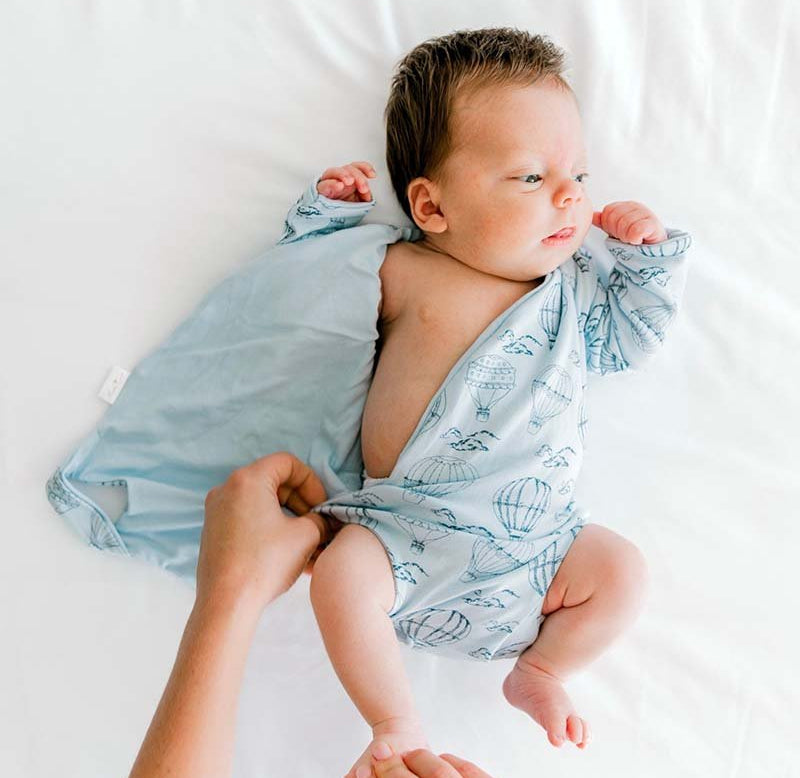 Long-sleeve winged bodysuit for babies.