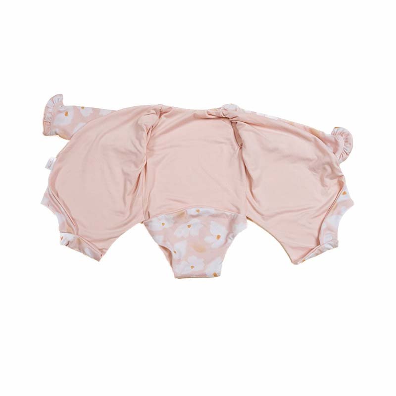 Stylish winged baby bodysuit with ruffle cuffs in soft Sweet Lily design classic brushed fabric with a reversible design.