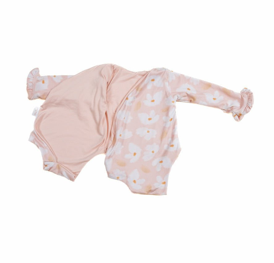Comfortable Sweet Lily design brushed fabric reversible baby bodysuit with wings and ruffle trim cuffs.