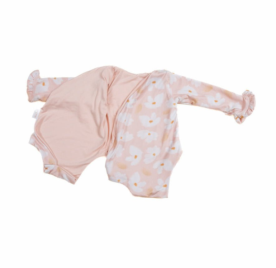 Comfortable Sweet Lily design brushed fabric reversible baby bodysuit with wings and ruffle trim cuffs.