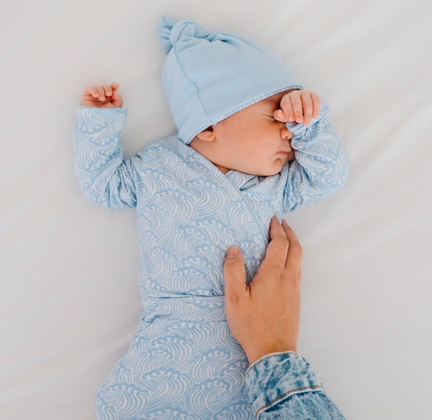 Blue Swells design baby winged bodysuit in classic brushed fabric.
