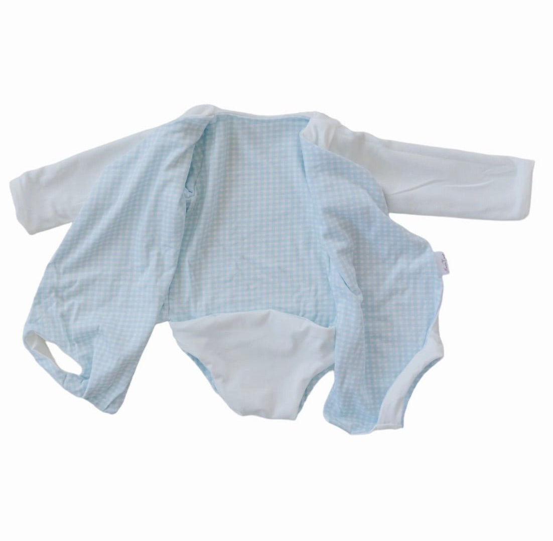 Long-sleeved reversible winged bodysuit for babies in silky modal fabric.