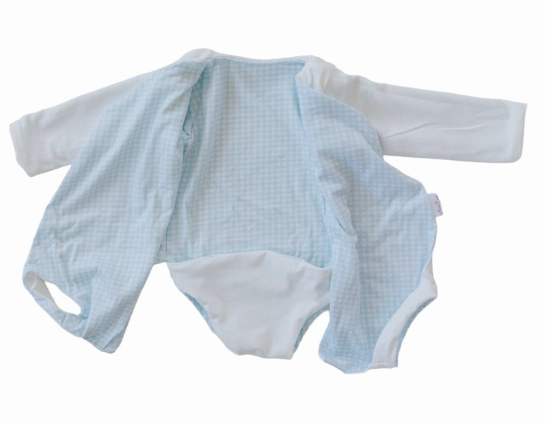 Long sleeved reversible winged bodysuit for babies in silky modal fabric.