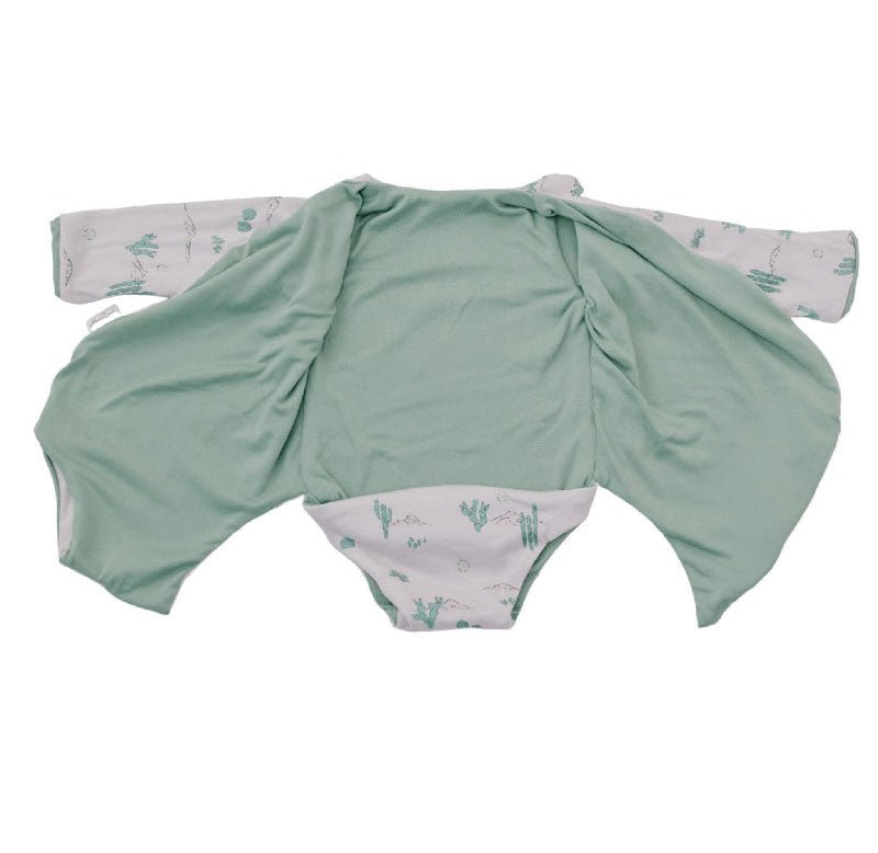 Long sleeved reversible winged bodysuit for babies in classic brushed fabric.