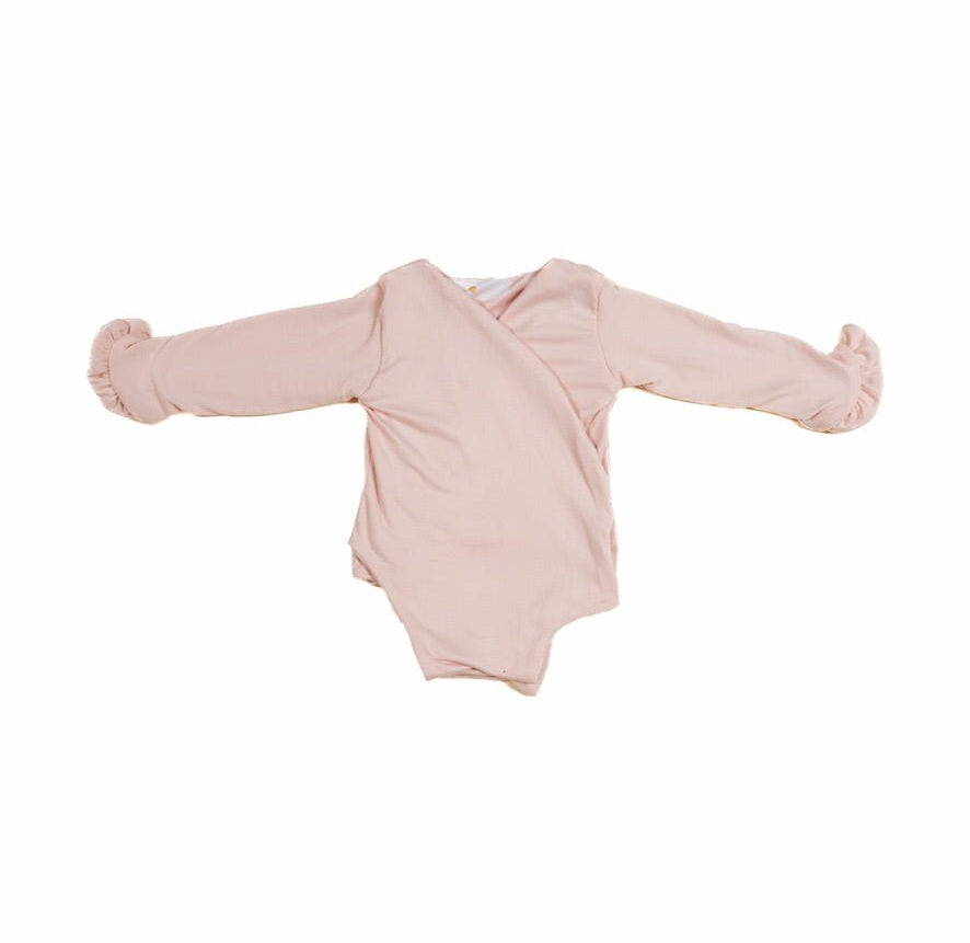 Baby long sleeve bodysuit in Sweet Lily design brushed fabric featuring reversible wings and ruffle cuffs.