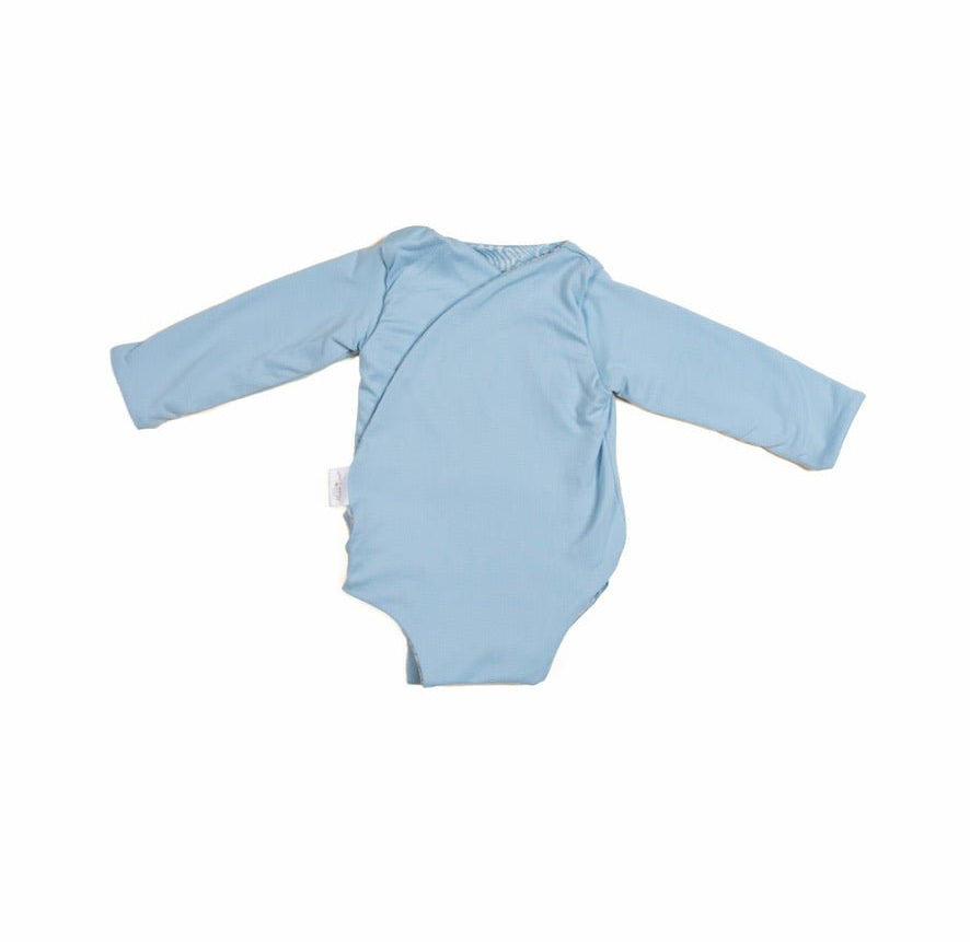 Reversible long sleeved winged bodysuit for babies in classic brushed fabric.