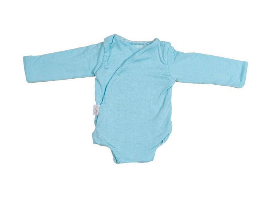 Long sleeved reversible winged bodysuit for babies in silky modal fabric.