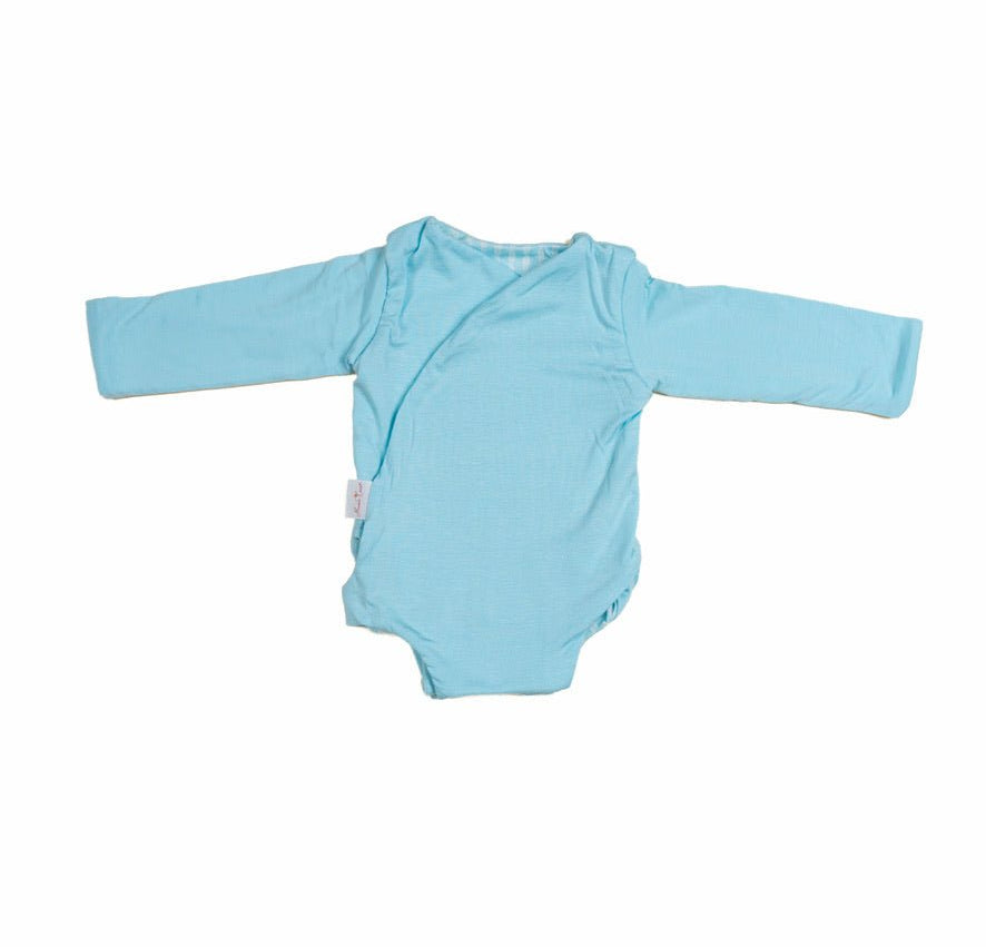 Long-sleeved reversible winged bodysuit for babies in silky modal fabric.