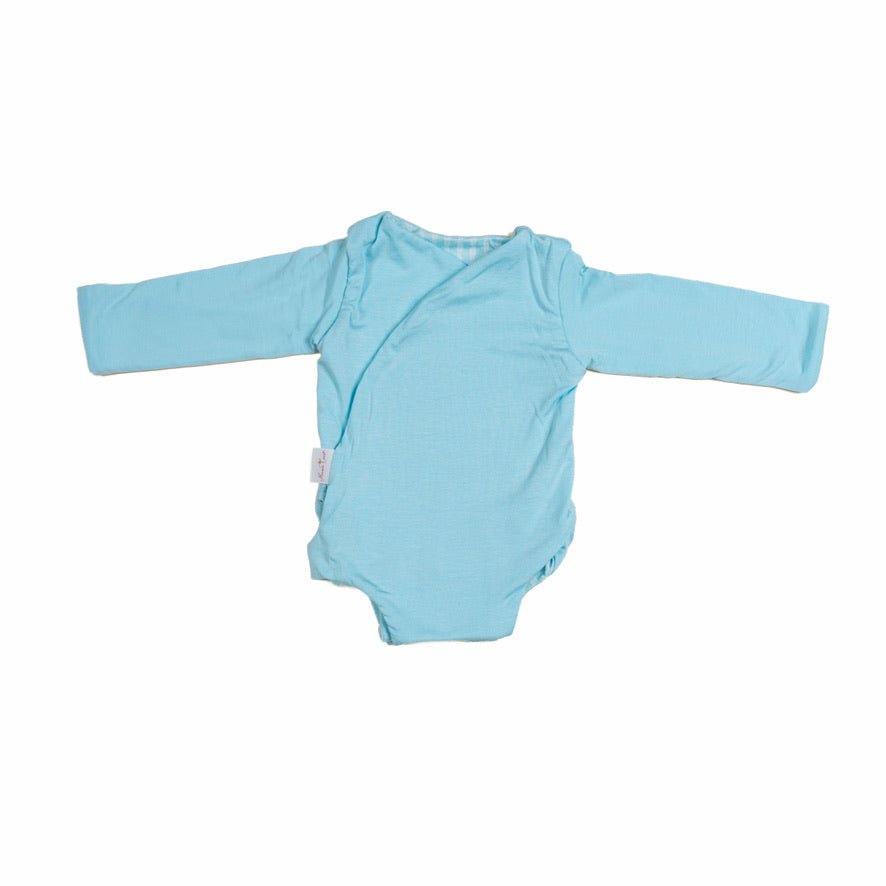 Long sleeved reversible winged bodysuit for babies in silky modal fabric.