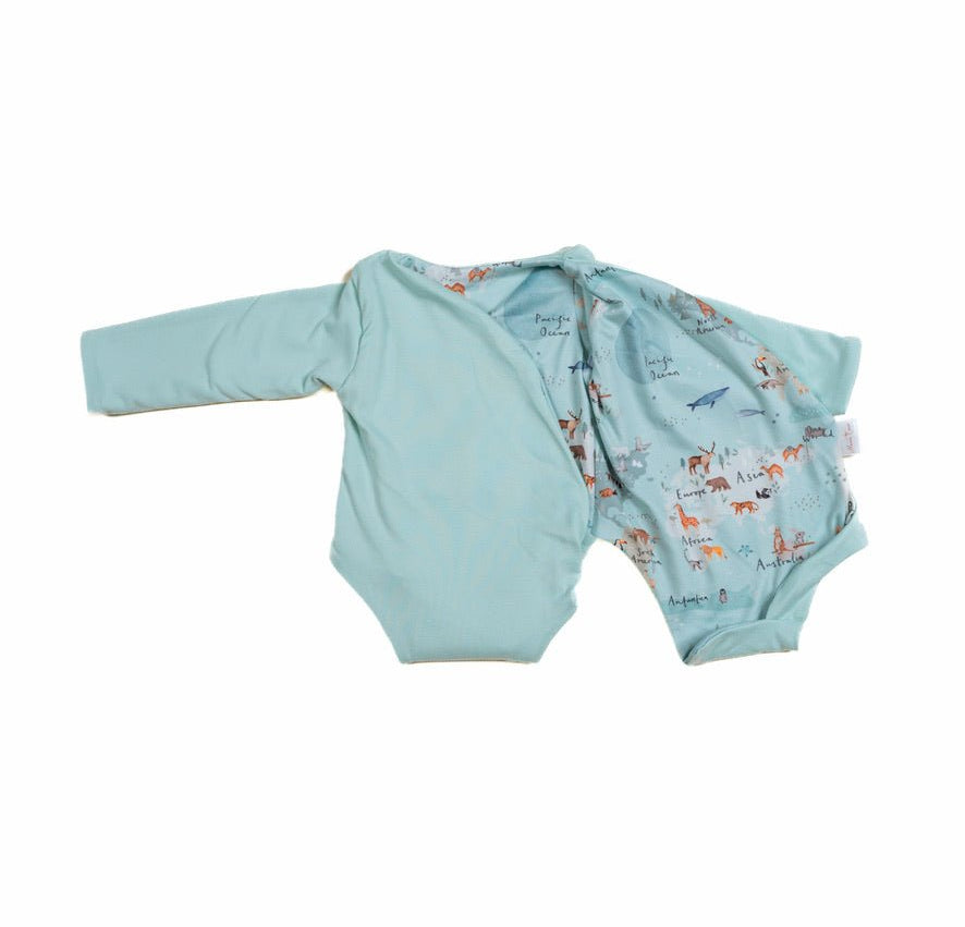 Long-sleeved reversible winged bodysuit for babies in classic brushed fabric.