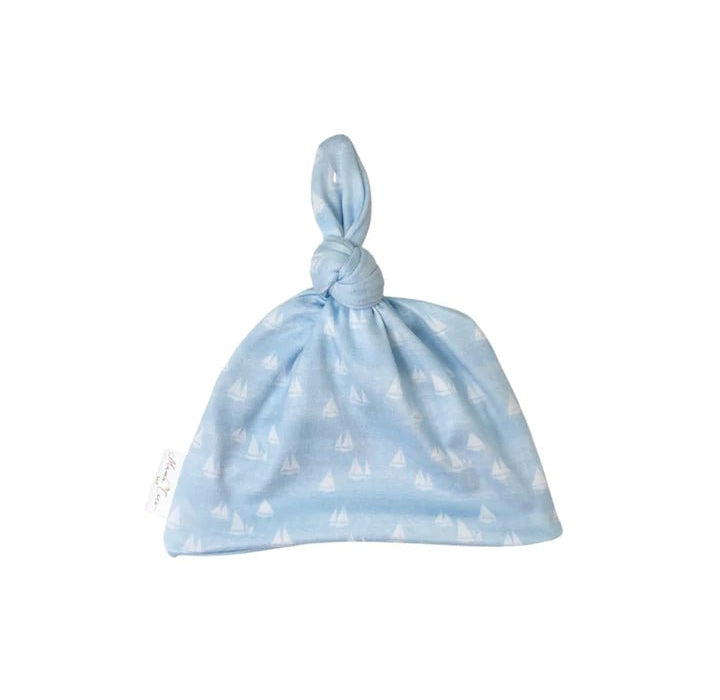 Reversible beanie in sailboat shores design.