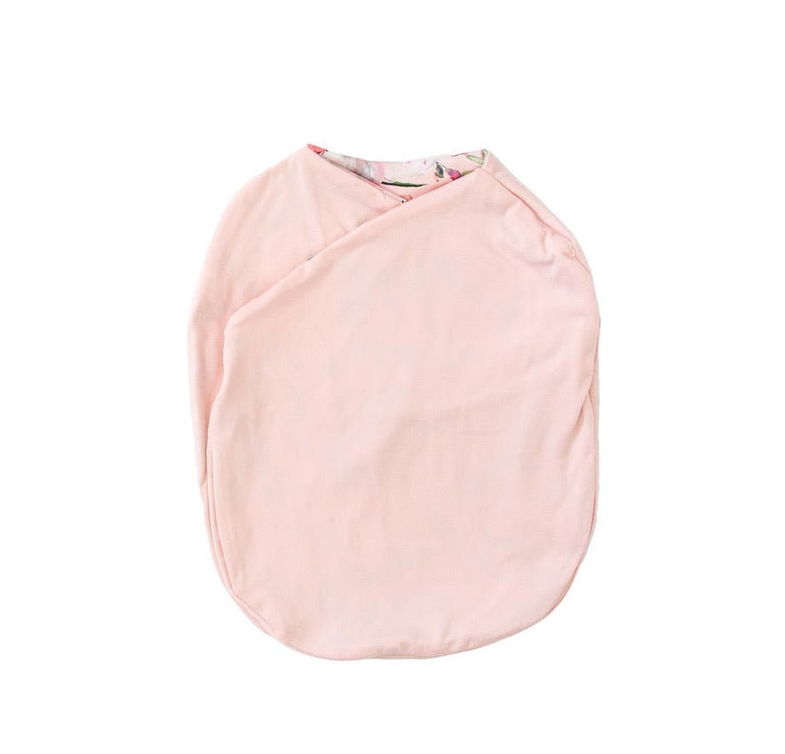 Baby cocoon swaddle blanket made with smooth Silky Modal in Peachy Rose Fields design.